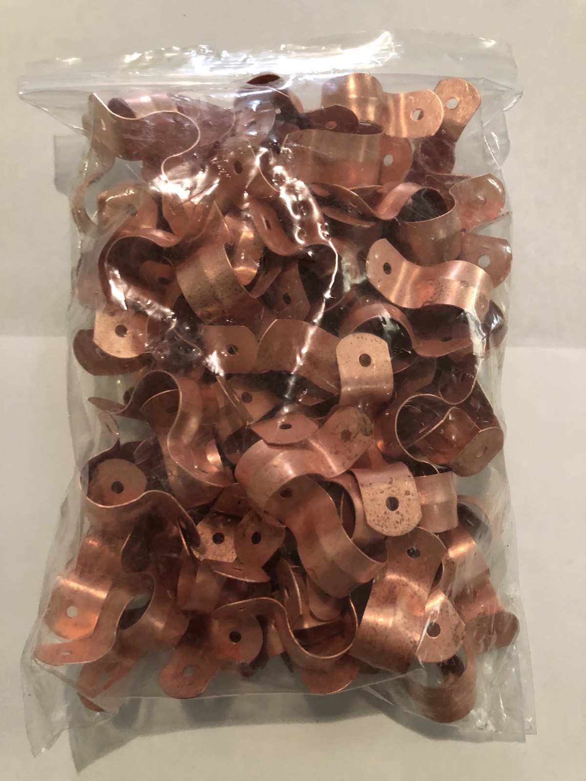 LOT OF 100 1/2″ (OD 5/8″)TWO HOLE COPPER FITTING PIPE TUBE STRAP PLUMBING.